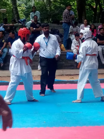 Action from a local Kyokushin tournament. I often serve as a referee, ensuring fights are conducted with respect and adherence to the rules of full-contact karate.