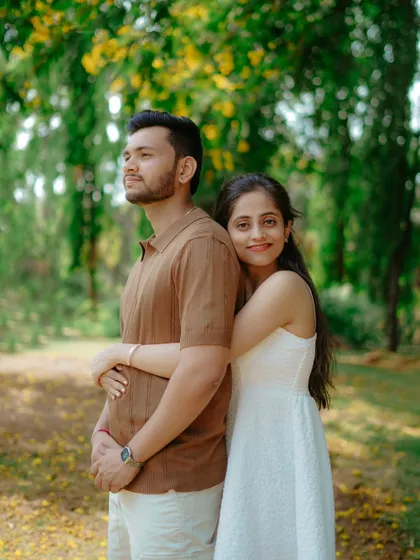 A quiet, loving pose in a sun-dappled park. This portrait of Umesh and Janhavi is serene, warm, and full of emotion.