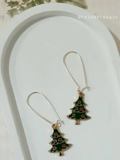 These Christmas tree hoop earrings are another one of my festive designs, perfect for showing off your holiday spirit.