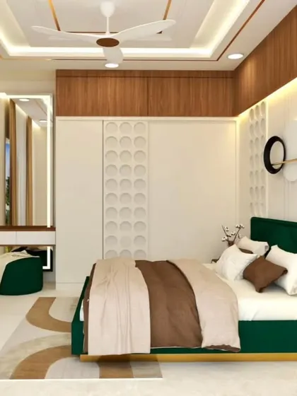 Another view of the green and white bedroom, showing the integrated vanity area. The design is cohesive, stylish, and practical.
