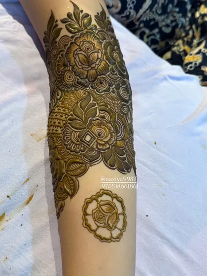 A detailed shot of a full arm design with fresh paste.