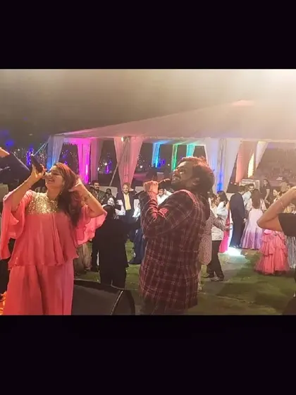 The entire band lost in the music during a fantastic Sangeet night. This is the passion and energy we bring to every single wedding event.