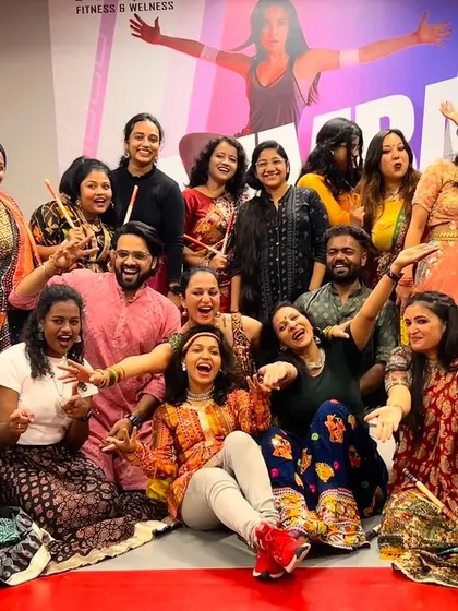 A happy group photo from a Garba workshop. This is what it's all about: community, laughter, and creating memories together through dance.