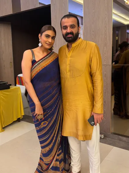 Another example of couple styling with my husband. My navy Tarun Tahiliani saree pairs beautifully with his simple mustard yellow kurta.