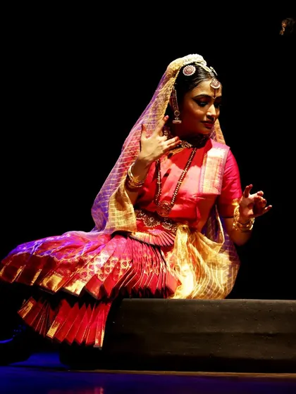 A moment from my student's Arangetram (debut recital), where I had the honor of leading the Nattuvangam.