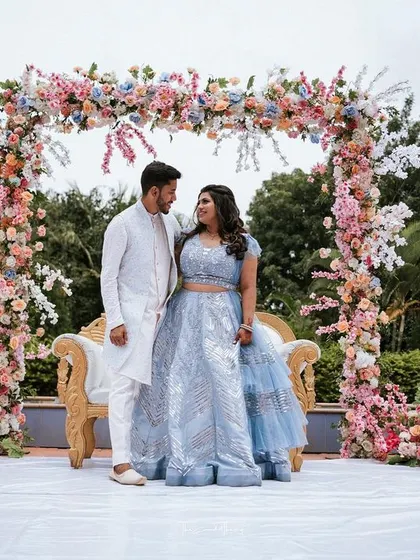 The two of us at our engagement, set against the beautiful floral decor. We can help you plan your dance entries and performances to complement your event's theme and decor perfectly.