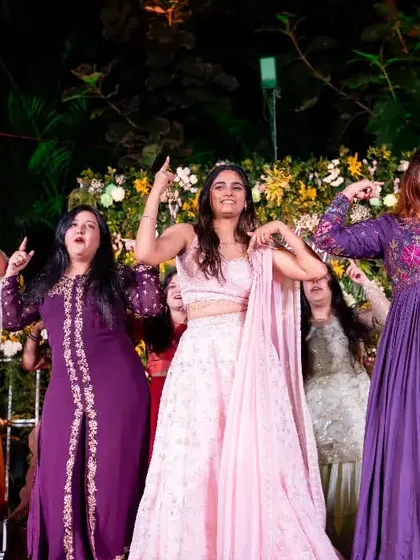 The girls striking a powerful pose during their group performance. Attitude is just as important as the steps.