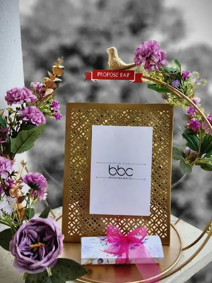 A black and white version of our "Propose Day" gift, which gives the elegant floral hoop and photo frame a timeless feel.