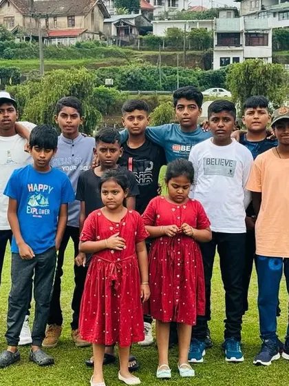 The team enjoys some sightseeing in the beautiful hills of Sri Lanka.