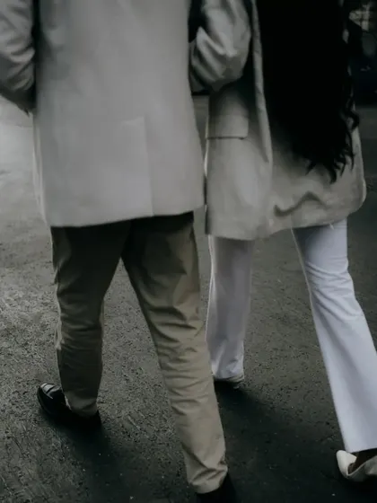 A candid shot of the couple walking away, captured from behind. It’s an artistic photo that suggests their journey forward together.