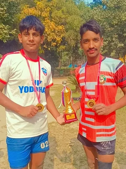 More of our victorious players, proudly displaying their medals and trophy. This is the result of relentless practice.