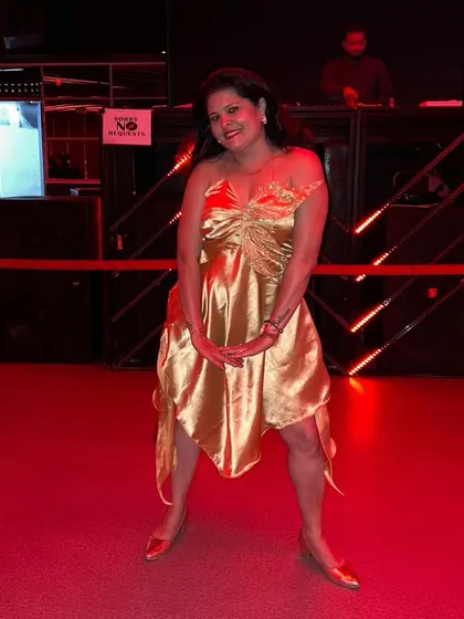 My bespoke birthday dress from my 'Golden Era' collection. This gold satin butterfly-themed dress was perfect for a night of dancing at the pub.