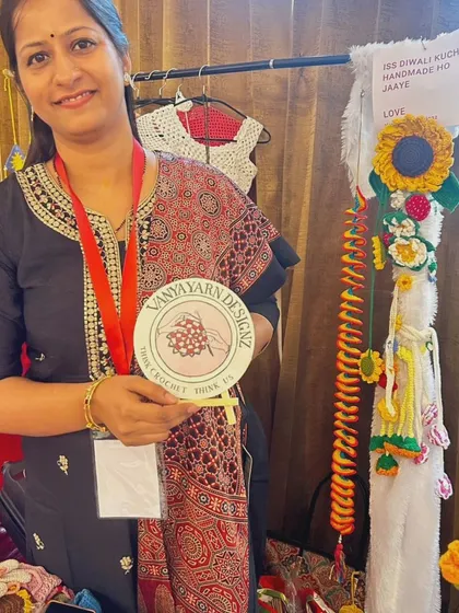 What a successful event. Thank you to everyone who supported my art. I am holding my logo, beautifully painted by a fellow artist.