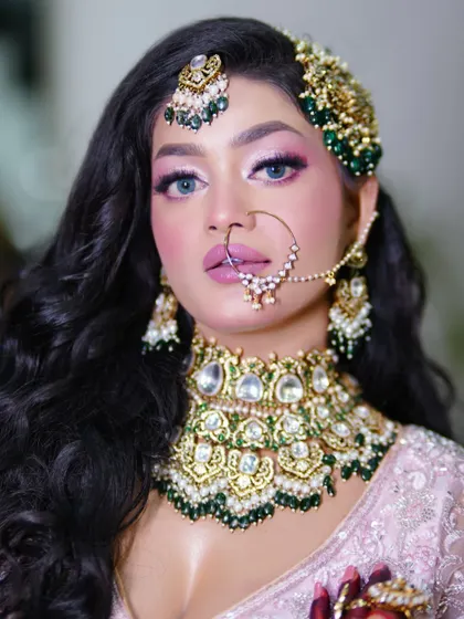 A close-up of the festive Eid makeup. The pop of color on the eyes is balanced with a soft pink lip.
