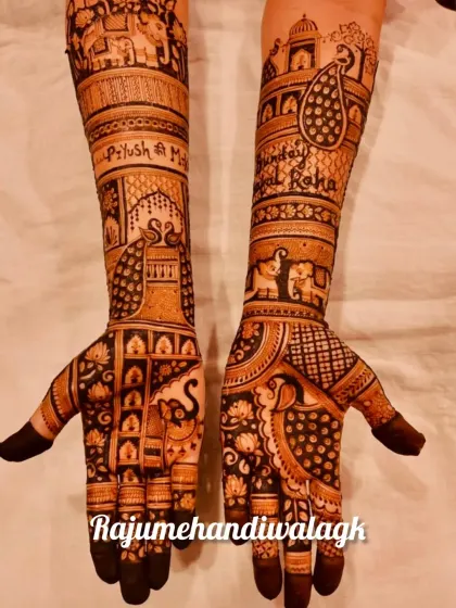 A personalized design that includes the couple's wedding hashtag, "Piyush ki Mehal," along with peacocks and elephants.