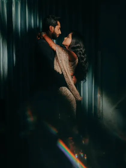 Another artistic shot from the same series, with the prism effect creating a beautiful, ethereal glow around the couple.