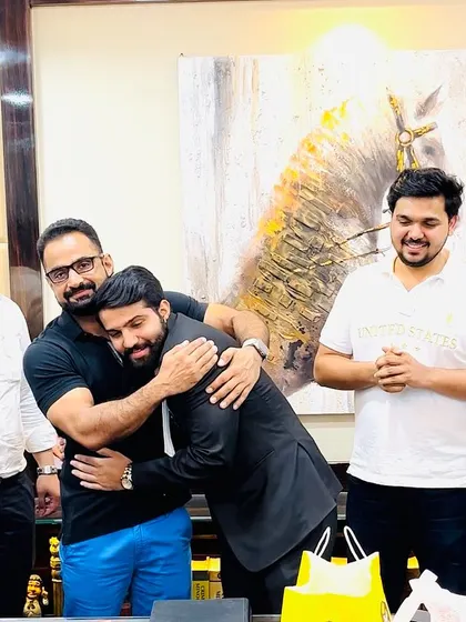 A celebratory hug for a junior who has just become an advocate. Marking these milestones together is part of what makes our team a family.