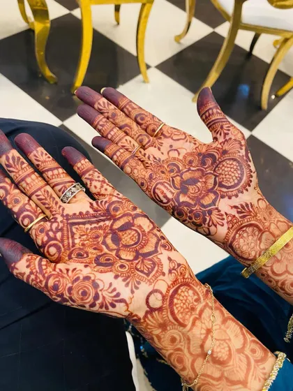 Here you can see the beautiful, deep reddish-brown stain that develops from my organic henna paste. I take great care to ensure the final color is rich and long-lasting, which is a key part of my service.