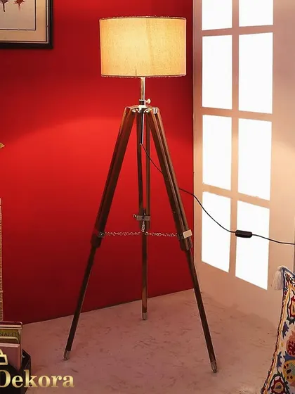 The adjustable wooden tripod lamp is a staple in our collection, valued for its classic design and adaptability. We handle large volume orders for this and other models for commercial and residential projects.