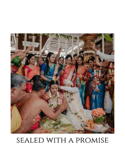 Sealed with a promise. The culmination of the wedding rituals, with the couple surrounded by family and friends showering them with blessings.