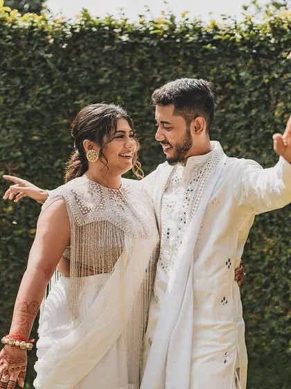 A sweet, candid moment from our Haldi photoshoot. It's all about capturing the love and happiness.