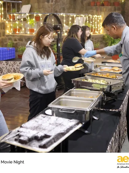Seniors line up for delicious food at the Senior Movie Night, hosted by our Parent Student Association. We believe in creating special, memorable experiences for our students as they approach graduation.
