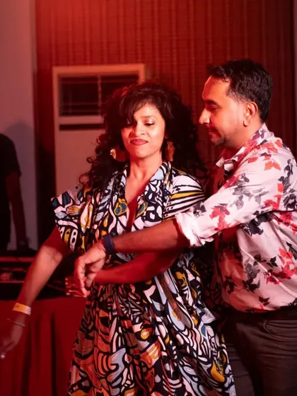 A moment of connection during a social dance at GIDC. It's all about the conversation between the lead and follow.