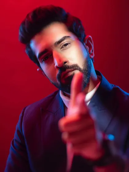 I love creating moody, cinematic portraits for actors. Here, I used a combination of red and blue gel lights to sculpt the face and create a sense of intensity and confidence. This style of actor headshot is great for showcasing a dramatic range and making a strong impression.
