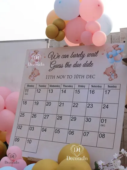 A "Guess the Due Date" calendar game, adding another layer of fun for the guests.