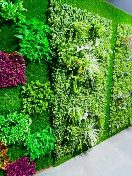 Here you can see a variety of artificial green wall panels I offer. From checkered patterns to mixed foliage, I can combine these to create a custom look for your space.