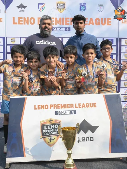 Another shot of our U9 team with their medals and trophy. A proud moment for the players, coaches, and parents.