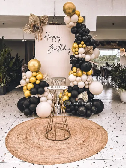 This black, white, and gold boho decor is perfect for a stylish indoor event.