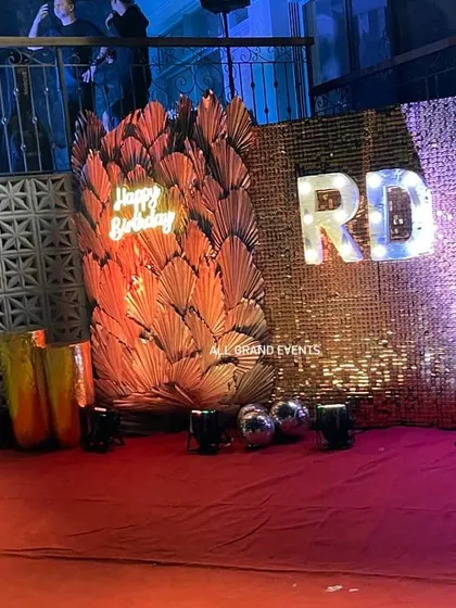 The backdrop seen from a side angle, showing its placement on a raised platform to give it more prominence at the venue.
