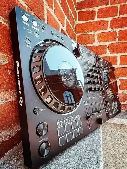 A beauty shot of a Pioneer DJ controller. Having the right professional equipment is essential for delivering a flawless performance.