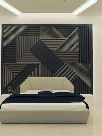 This bedroom design features a bold, geometric headboard that doubles as a piece of art. The unconventional shape of the bed and the abstract wall paneling create a unique and highly modern aesthetic.