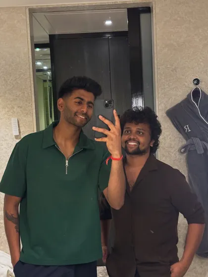A relaxed shot with Mayank Yadav after his haircut.