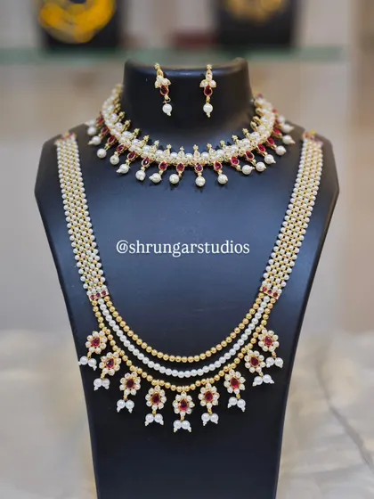 Unique caption for media id 77 describing the specific jewellery and look.