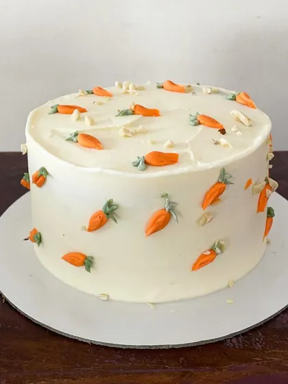 Getting ready for Easter with these adorable carrot cakes. I offer different styles, from a simple cake decorated with tiny piped carrots to a more rustic version with dollops of cream cheese frosting.