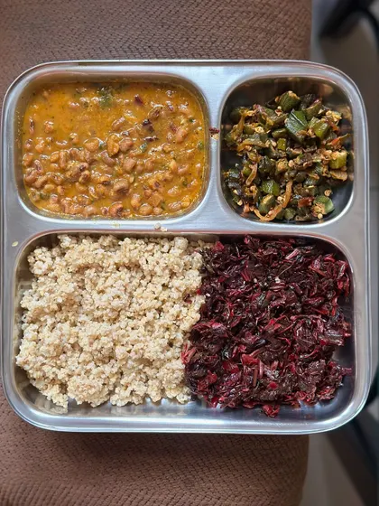 Another look at the nutrient-packed foxtail millet plate with cowpea curry, sautéed okra, and amaranth leaves.