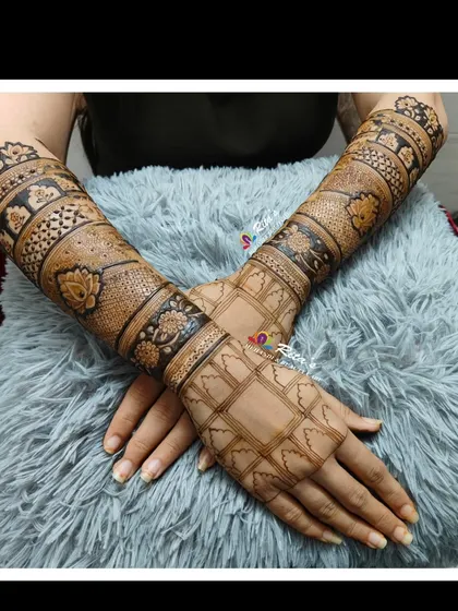 A full view of a beautiful and intricate back-hand design. This shows the level of detail and symmetry I strive for in all my work.