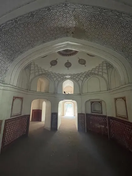The stunningly restored ceiling of a tomb in Sunder Nursery, with intricate incised plaster and painted patterns. This demonstrates the high level of artistry in Mughal decoration.