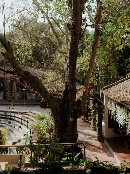 A wide view of the beautiful heritage venue, showcasing its lush greenery and traditional architecture.