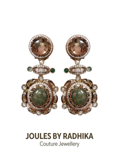 The statement earrings that graced the Cannes red carpet. Worn by Anushka Sen, these feature intricate work with semi-precious stones, designed to capture the drama of the moment.