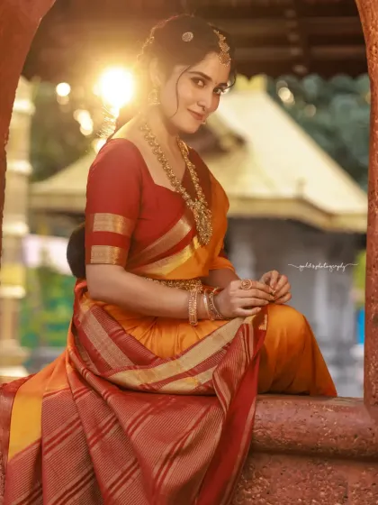 A stunning portrait taken at golden hour. The warm light illuminates the bride and her surroundings, creating a magical and romantic atmosphere.
