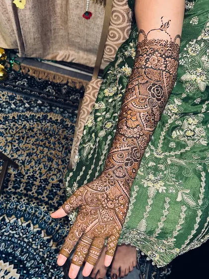 A full view of the arm, showcasing the beautiful flow of the design from the wrist to the elbow.