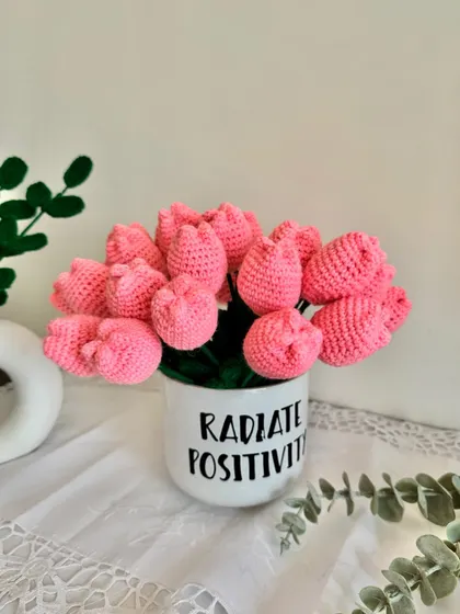 The soft pink of these crochet tulips is so calming. They look beautiful bunched together in this simple white mug.