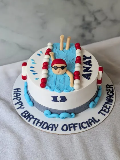 For a swimming champ turning into an official teenager. This cake features a swimmer in a pool lane, perfect for a 13th birthday.