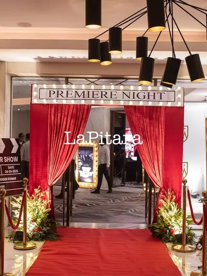 Another angle of the glamorous red carpet entrance, creating a true movie premiere experience for the guests.