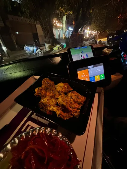 The perfect setup: delicious food from Degnama and a live cricket match. This content is highly relatable and showcases a brand as part of an ideal everyday experience.