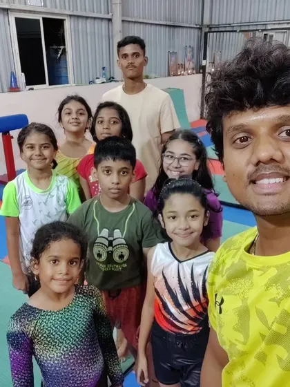 A selfie with the squad. Our coaches love capturing these happy moments with their students, celebrating the fun and camaraderie that defines our gym.
